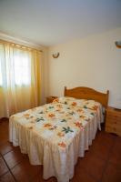 Łóżko lub łóżka w pokoju w obiekcie Casa El Morero
