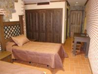 Posteľ alebo postele v izbe v ubytovaní Hotel Rural El Rocal