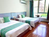 M Hotel Xiamen Haicang Maqing Road Metro Stationにあるベッド