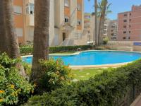 The swimming pool at or close to .Apartamento 1a linea de playa + piscina + parking DAIMUS