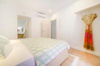Łóżko lub łóżka w pokoju w obiekcie Petit Biniaraix - Ex Menditzu Rooms