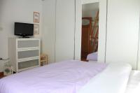 Posteľ alebo postele v izbe v ubytovaní Apartment Apolon planinski
