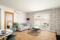 A seating area at Apartamentos Pedregalejo Beach Playa