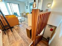 Część wypoczynkowa w obiekcie Cosy Duplex avec Parking à Paris 19 by immo kit bnb