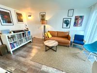 Część wypoczynkowa w obiekcie Cosy Duplex avec Parking à Paris 19 by immo kit bnb