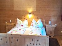 Łóżko lub łóżka w pokoju w obiekcie Chalet Anna