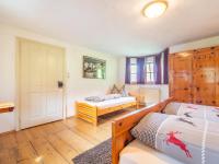 Łóżko lub łóżka w pokoju w obiekcie Chalet Anna