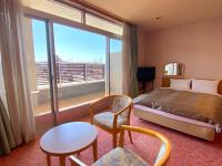 Ένα ή περισσότερα κρεβάτια σε δωμάτιο στο Hotel Lavenir