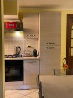 A kitchen or kitchenette at LA CASA TRA GLI ULIVI