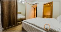 Postel nebo postele na pokoji v ubytování Luxurious hotel apartment with 2 master bedroom,3 -bathroom in Mivida New Cairo - 5B