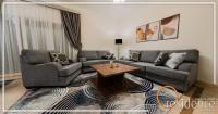 Posezení v ubytování Luxurious hotel apartment with 2 master bedroom,3 -bathroom in Mivida New Cairo - 5B