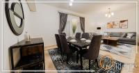 Posezení v ubytování Luxurious hotel apartment with 2 master bedroom,3 -bathroom in Mivida New Cairo - 5B