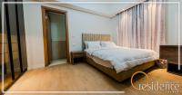 Postel nebo postele na pokoji v ubytování Luxurious hotel apartment with 2 master bedroom,3 -bathroom in Mivida New Cairo - 5B