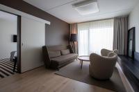 TV a/nebo společenská místnost v ubytování Hedon Spa & Hotel