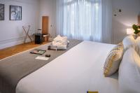 A bed or beds in a room at Hotel SERHS Rivoli Rambla