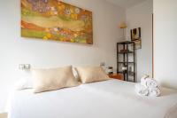 Posteľ alebo postele v izbe v ubytovaní HomeHolidaysRentals Blanescel - Costa Brava