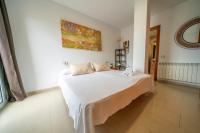 Posteľ alebo postele v izbe v ubytovaní HomeHolidaysRentals Blanescel - Costa Brava