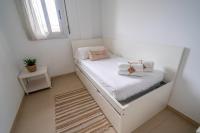 Posteľ alebo postele v izbe v ubytovaní HomeHolidaysRentals Blanescel - Costa Brava
