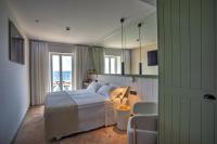 Posteľ alebo postele v izbe v ubytovaní Hostal Olga