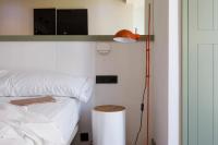 Posteľ alebo postele v izbe v ubytovaní Hostal Olga