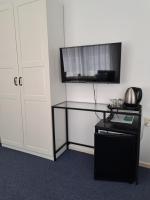 Hotel Het Gouden Boltjeにあるテレビまたはエンターテインメントセンター
