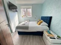 Postel nebo postele na pokoji v ubytování ND Hotel - Hyde Park