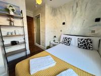 Postel nebo postele na pokoji v ubytování ND Hotel - Hyde Park