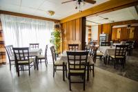 A restaurant or other place to eat at Solar Club Apartman Sopron