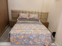Postel nebo postele na pokoji v ubytování Apartment Hossam 2 - Hurghada