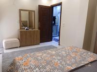 Postel nebo postele na pokoji v ubytování Apartment Hossam 2 - Hurghada