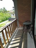 Ein Balkon oder eine Terrasse in der Unterkunft Red Coral Cottage
