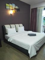 Ein Bett oder Betten in einem Zimmer der Unterkunft Red Coral Cottage