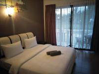 Ein Bett oder Betten in einem Zimmer der Unterkunft Red Coral Cottage