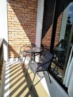 Ein Balkon oder eine Terrasse in der Unterkunft Red Coral Cottage