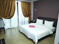 Ein Bett oder Betten in einem Zimmer der Unterkunft Red Coral Cottage