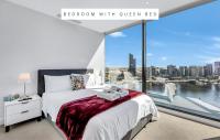 Melbourne Lifestyle Apartments - Best Views on Collinsにあるベッド