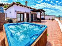 The swimming pool at or close to Elegant Villa with Jacuzzi in Canillas de Albaida