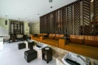 a lobby with two couches and a salon at Hidden Beach Resort Au Naturel Adults Only Catamarán, Cenote & More Inclusive in Akumal