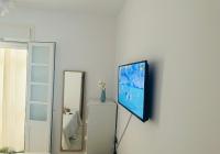 TV a/nebo společenská místnost v ubytování Bonito apartamento junto al Gran Teatro Falla