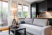 Posedenie v ubytovaní Modern 70m Apartment With Private Garden Metro