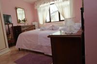 Łóżko lub łóżka w pokoju w obiekcie La casa di Cristina