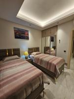 Postel nebo postele na pokoji v ubytování Cebeci Towers Luxury