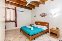 Posteľ alebo postele v izbe v ubytovaní House Verona Zen