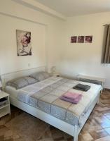 Posteľ alebo postele v izbe v ubytovaní Apartman Ferenac