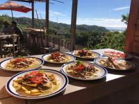 a group of plates of food on a table at Hotel Quinto Sol in Mazunte