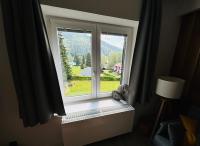 Nespecifikovaný výhled na hory nebo výhled na hory při pohledu z apartmánu