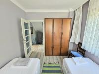 Postel nebo postele na pokoji v ubytování Çalık Villa Trabzon