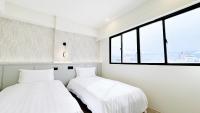 Yoai Mountain Roam Hotelにあるベッド