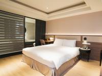 Royal Rose Hotel Zhongshanにあるベッド