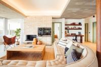 A television and/or entertainment centre at Villa Tramuntana Luxury Sea View Retreat - Cap d'en Font, Menorca